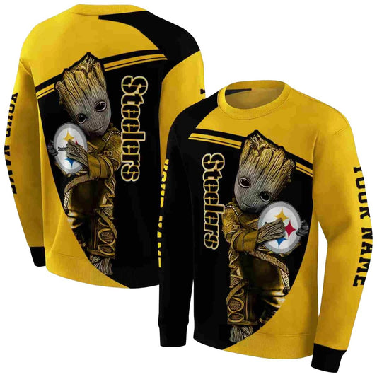 Personalized Pittsburgh Steelers Baby Groot Hug Logo Gold AOP Sweatshirt - Moonbestprint